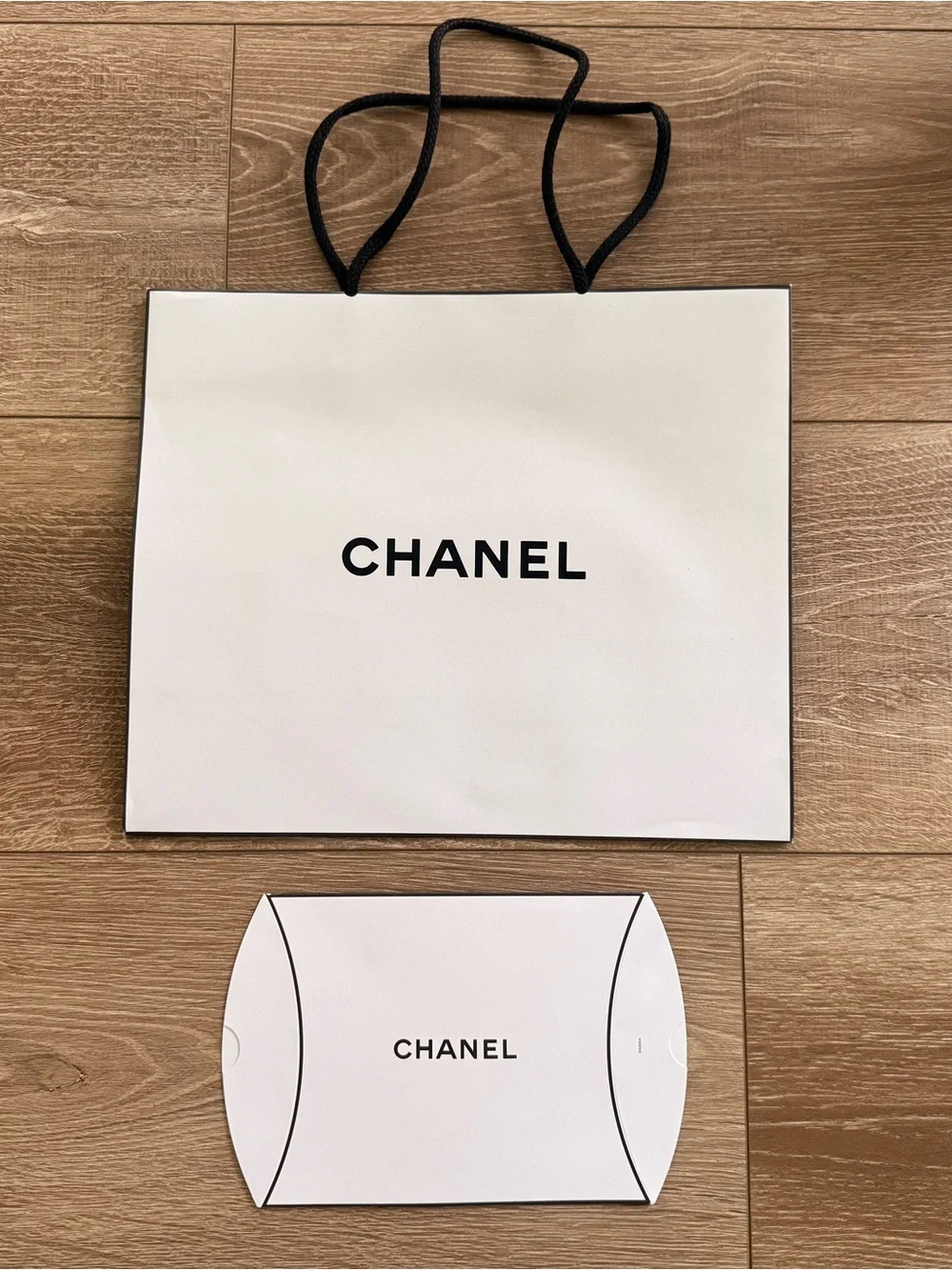 CHANEL White Paper Shopping Tote with Black Handles includes small gift box